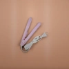 The pink hair straightener features a constant-temperature ceramic straight plate and is a dual-purpose household hair care tool for curling and straightening hair details Picture